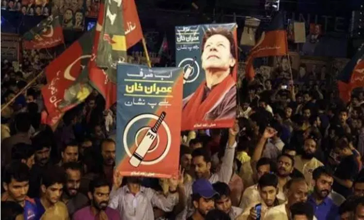 imran supporters after election AP Photo K.M. Chaudary