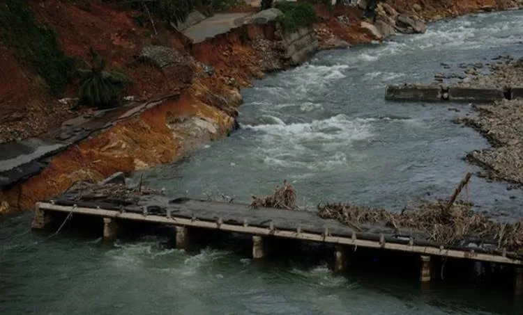 The bridge over the river collapsed when the shutters of the dam were openedExpress Photo Arun Janardhanan