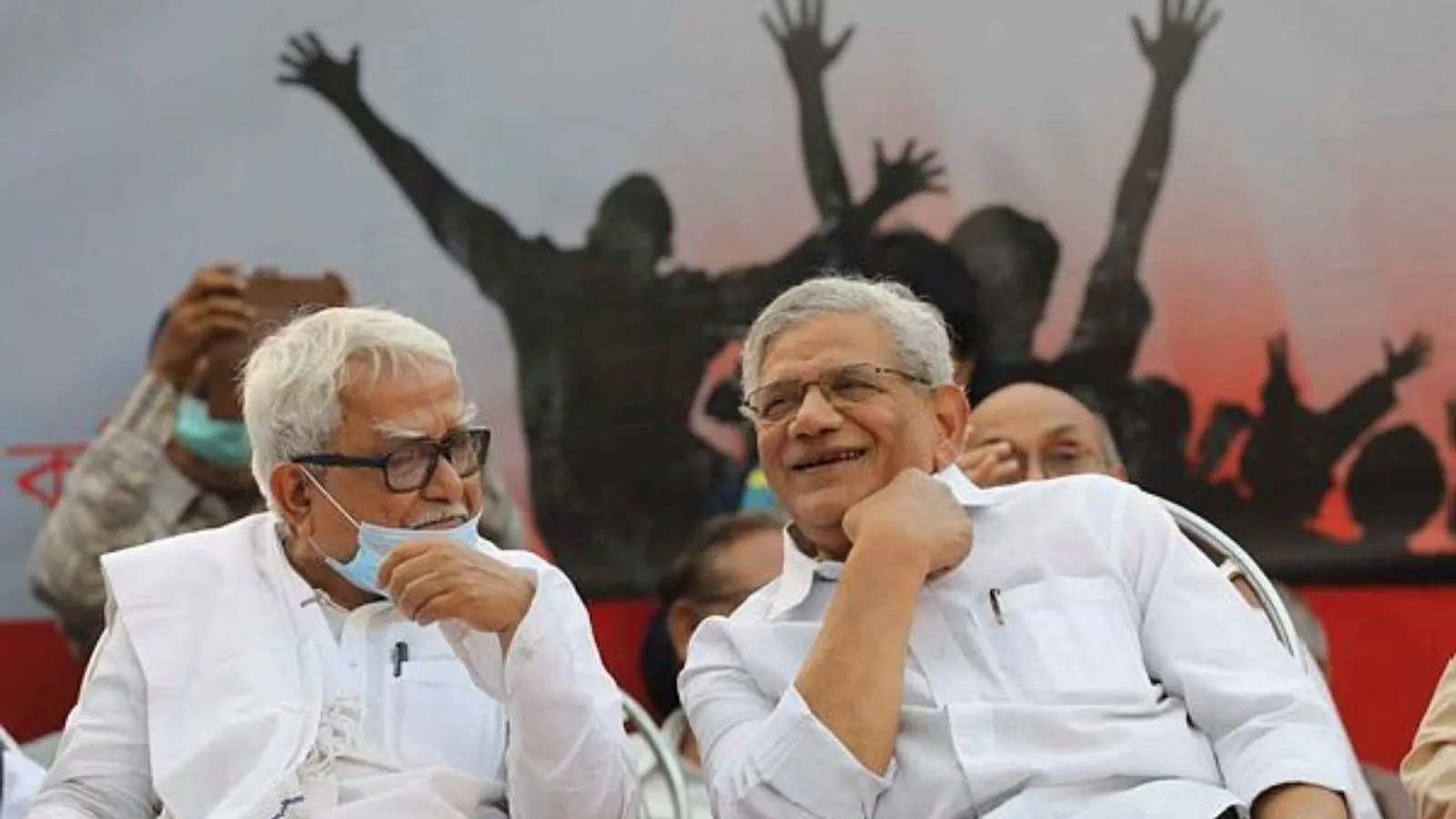 CPIM general secretary Sitaram Yechury and Left front chairman Biman Bose during rally in Kolkata. 