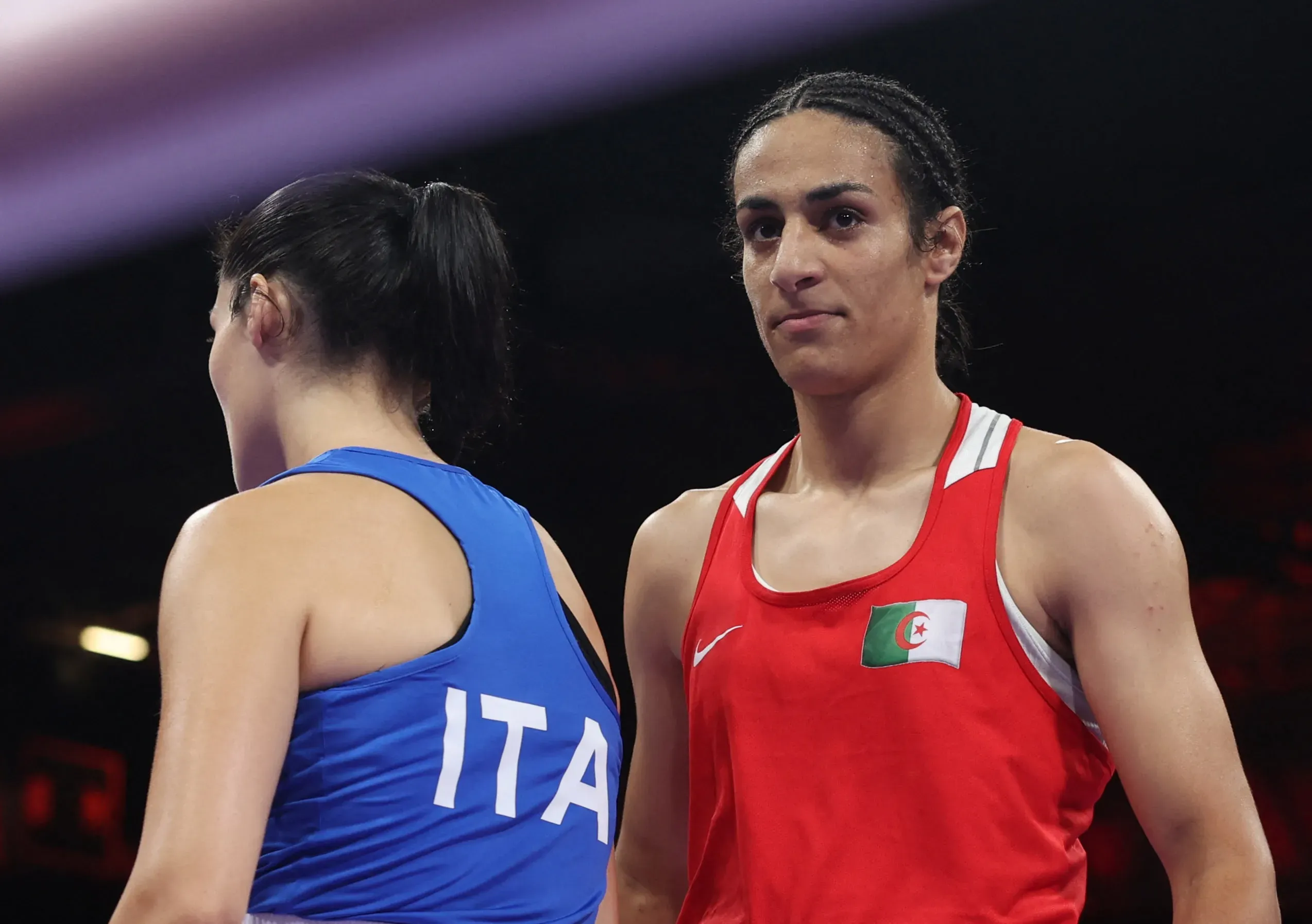 Imane Khelif (R) and Angela Carini (L) react after their fight. REUTERS/Isabel Infantes