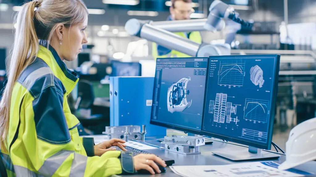At the Factory: Female Mechanical Engineer Designs 3D Engine on