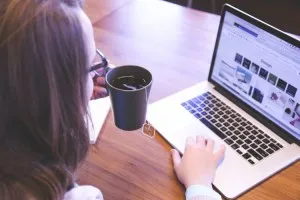 woman-computer-laptop-coffee-1-750x500