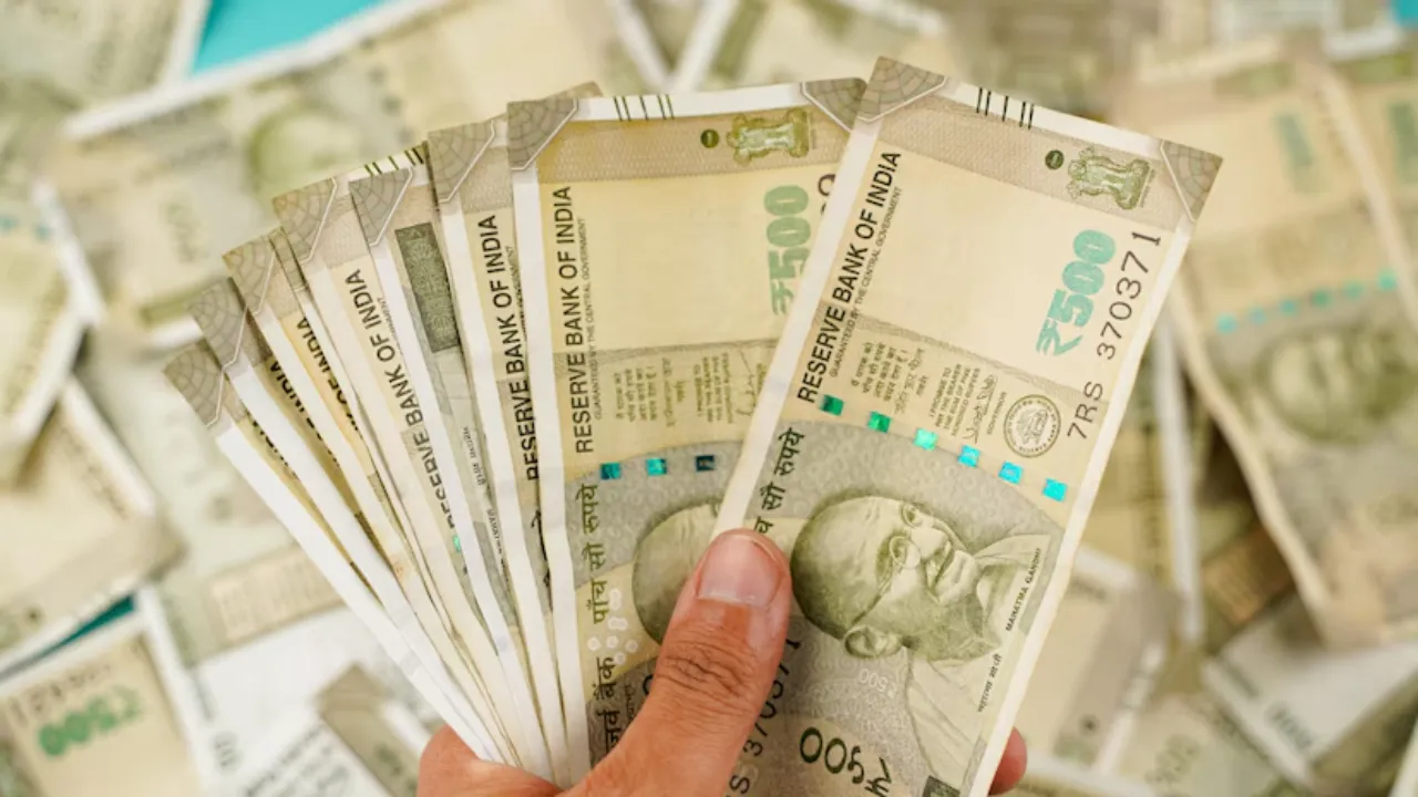 Rupee falls to a record low of 87.96
