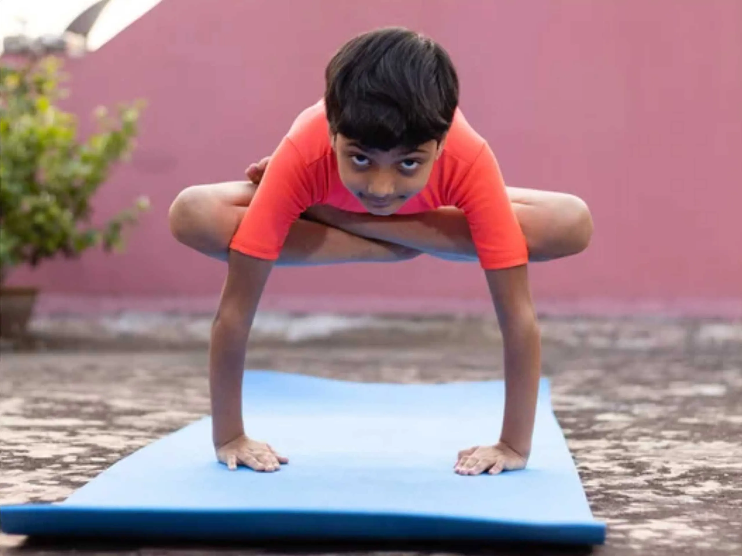 kid doing yoga