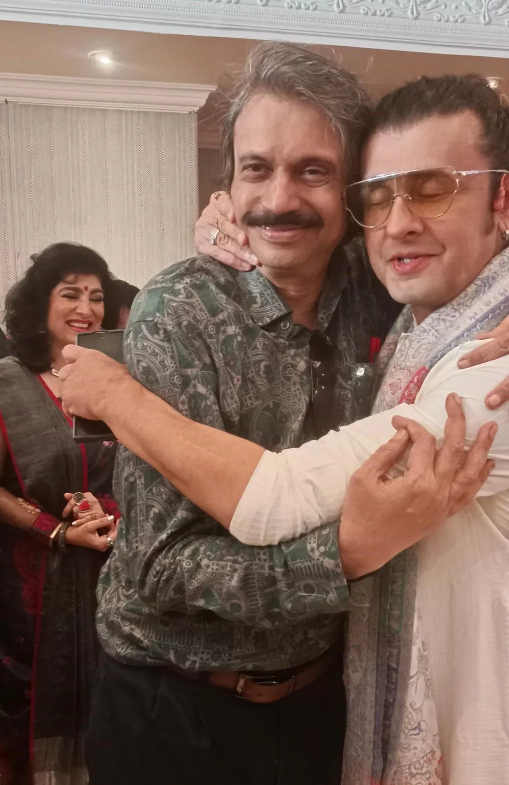 Sonu Nigam (right)  welcoming Chaitanya Padukone during a pre-Diwali event