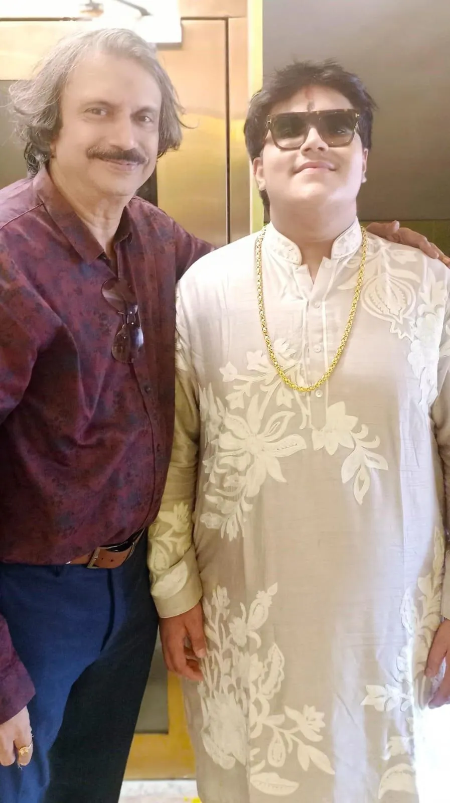 Saraswati Puja --Rego B (right) with senior journalist Chaitanya Padukone
