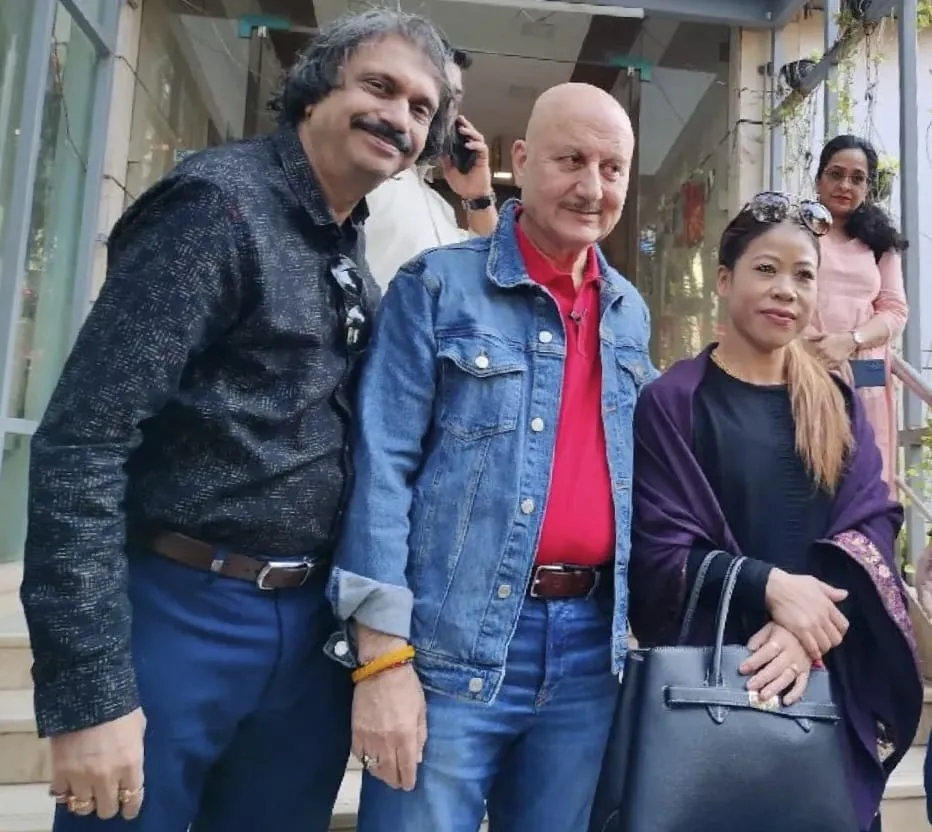 Anupam Kher with 8-times World Boxing Champion Mary Kom and sr journalist Chaitanya Padukone
