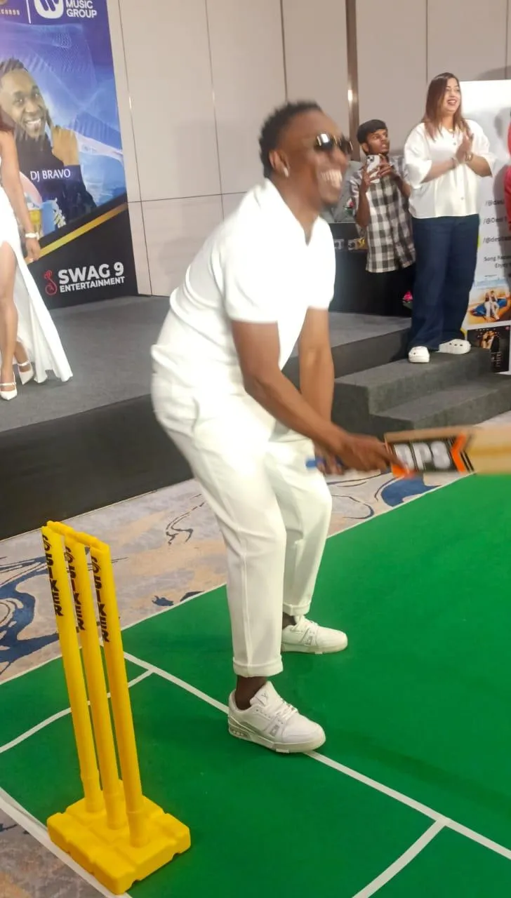 Scoring Sixers for Music Passion-Singer D J Bravo swings bat on the indoor pitch 