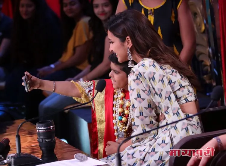 Parineeti Chopra poses with contestant Devyansh on Comedy Circus