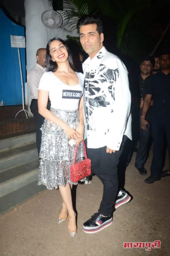 Kiara Advani with Karan Johar at the Success bash of Lust stories.