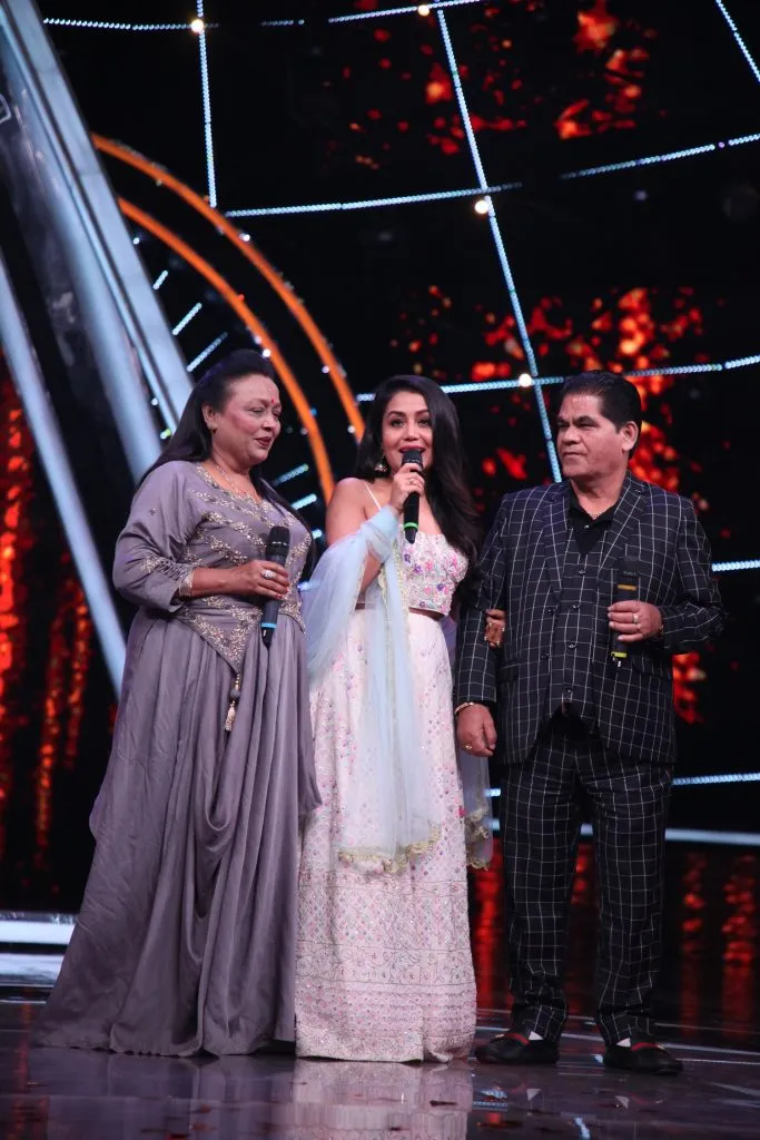 Neha Kakkar and her parents