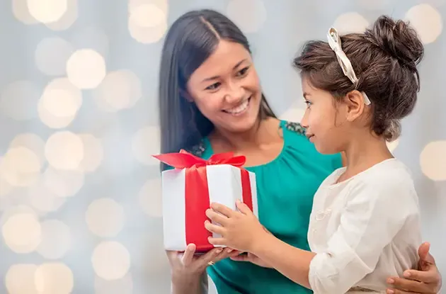 how to make your kids happy not spoiled and give back | NYMetroParents
