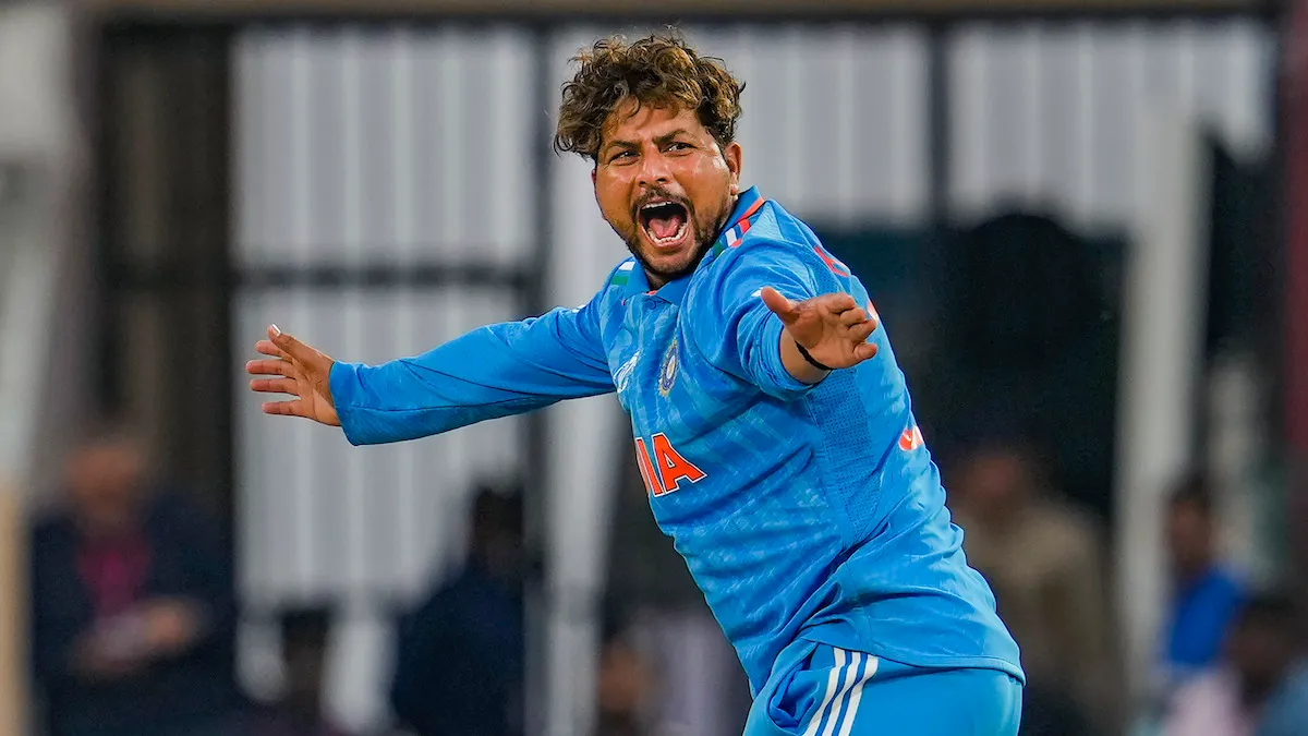 India's Kuldeep Yadav successfully appeals for the wicket of New Zealand's Tom Lathan during the ICC Men's Cricket World Cup 2023 match between India and New Zealand at HPCA Stadium, in Dharamsala, Sunday, Oct. 22, 2023.