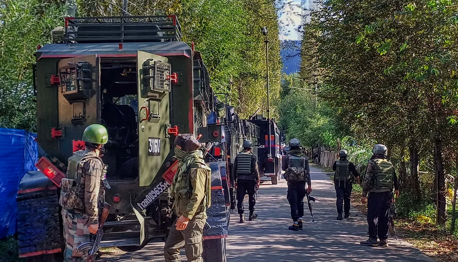 Security personnel during the ongoing encounter with terrorists, at Gadol Kokarnag in Anantnag district