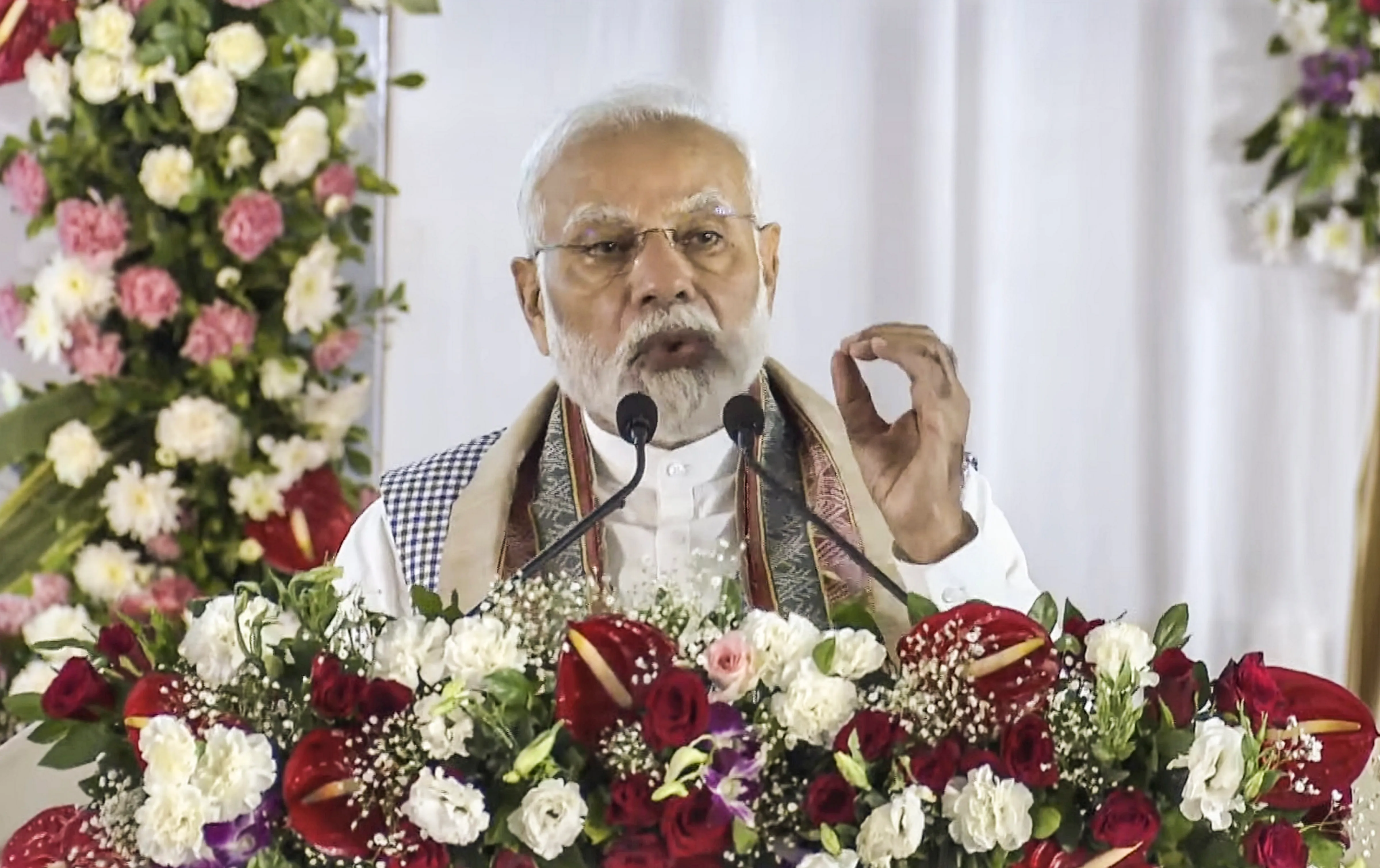 Prime Minister Narendra Modi addresses during the inauguration and foundation stone laying ceremony of several developmental projects, in Raipur, Friday.jpg