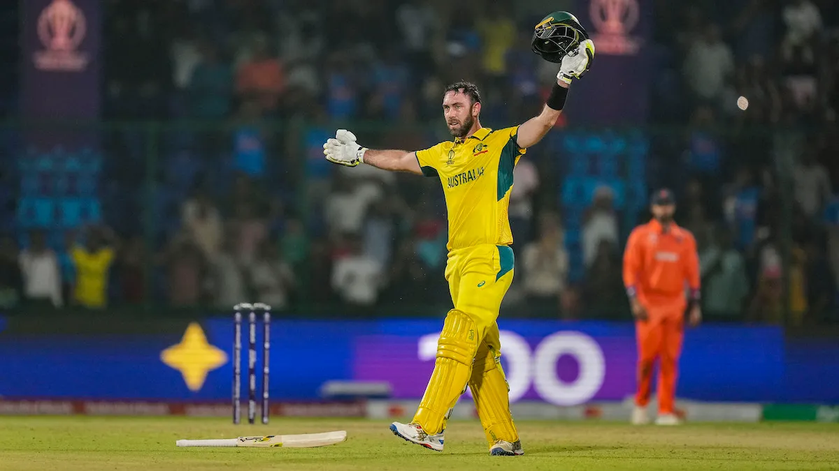 Glenn Maxwell celebrates his century during the ICC Men's Cricket World Cup 2023 match between Australia and Netherlands, at the Arun Jaitley Stadium, in New Delhi, Wednesday, Oct. 25, 2023.