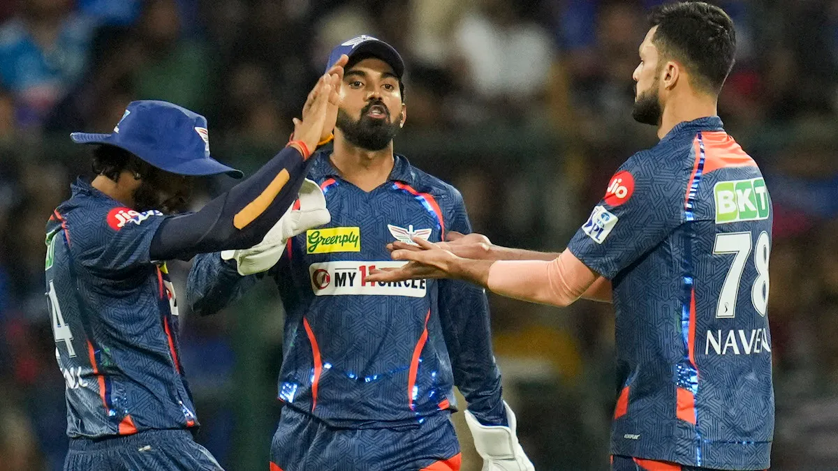 Lucknow Super Giants's Naveen-ul-Haq celebrates after taking the wicket of Royal Challengers Bengaluru batter Dinesh Karthik at M Chinnaswamy Stadium, in Bengaluru, Tuesday, April 2, 2024.