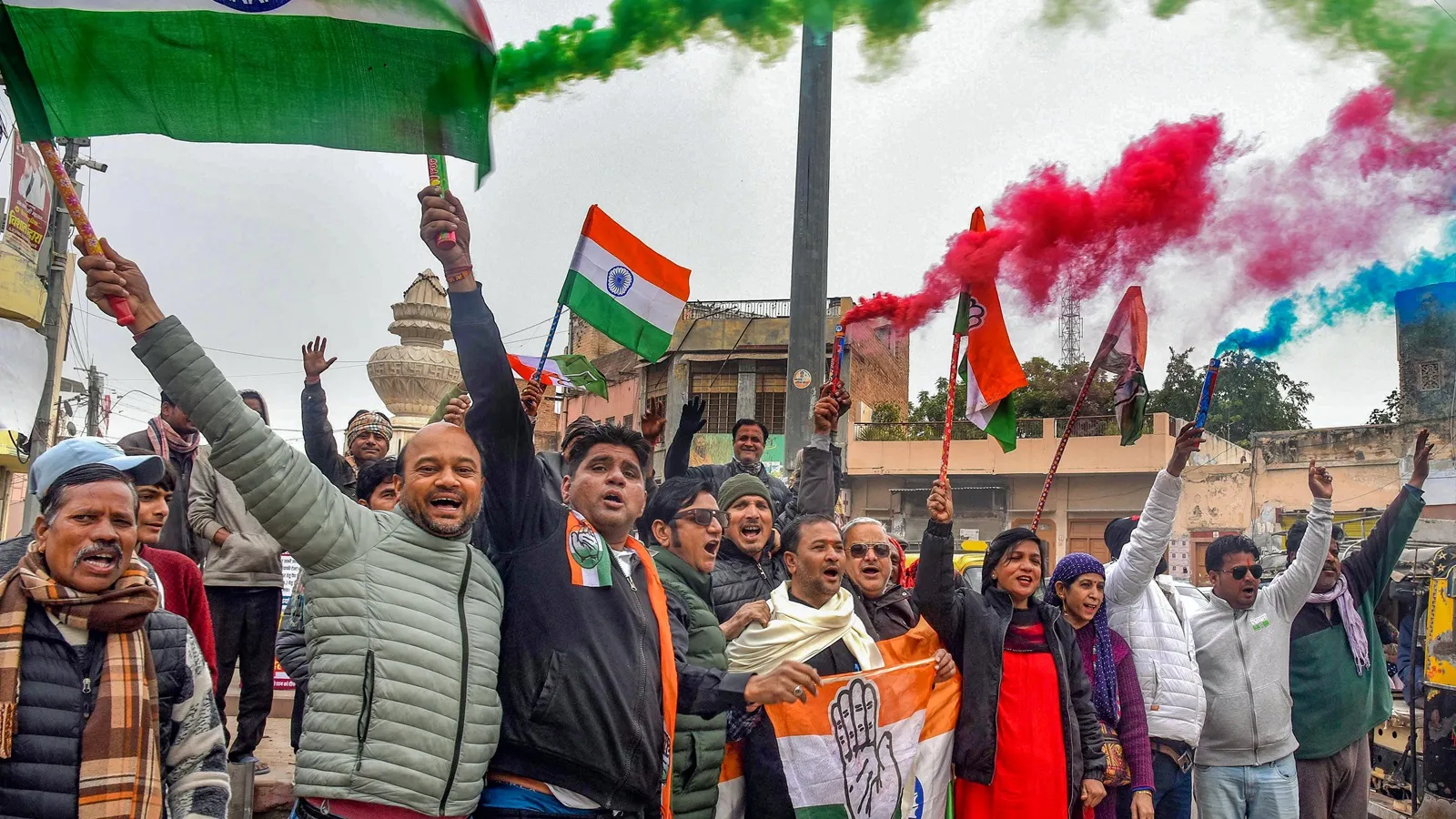 Congress supporters celebrate after party's leader Rupinder Singh Koonar won the Karanpur assembly election
