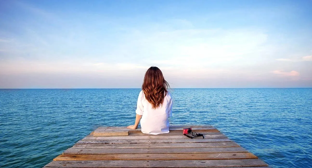 A girl sitting alone