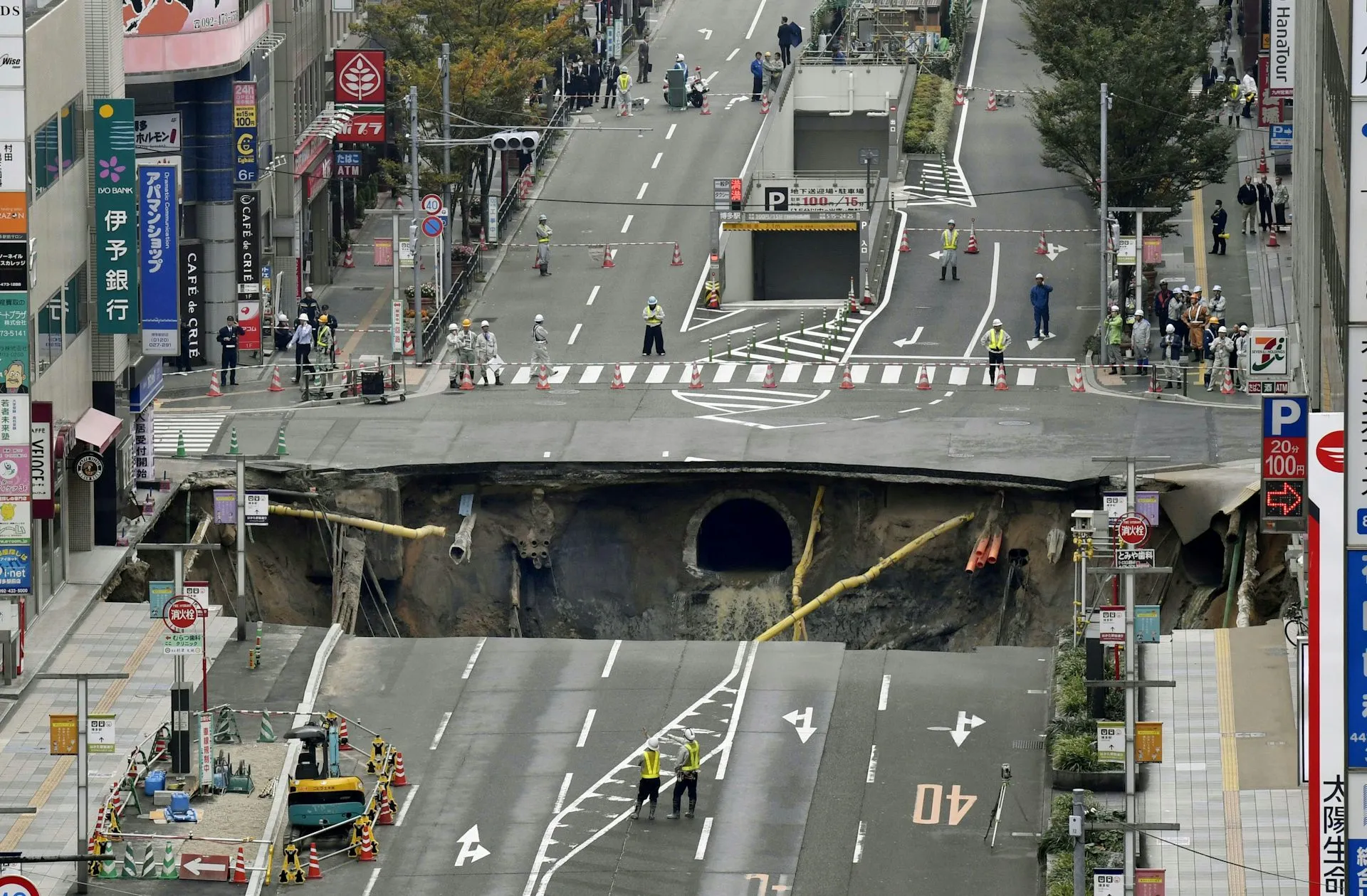 A massive sinkhole is created in the middle of the business district in Fukuoka, southern Japan in 2016.