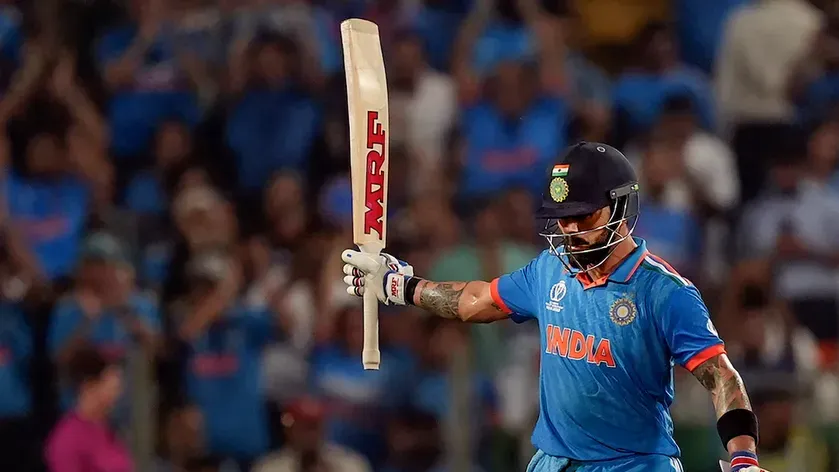 Virat Kohli celebrates his half century during the ICC Men's Cricket World Cup 2023 match between India and Bangladesh, at Maharashtra Cricket Association Stadium, in Pune, Thursday, Oct. 19, 2023.