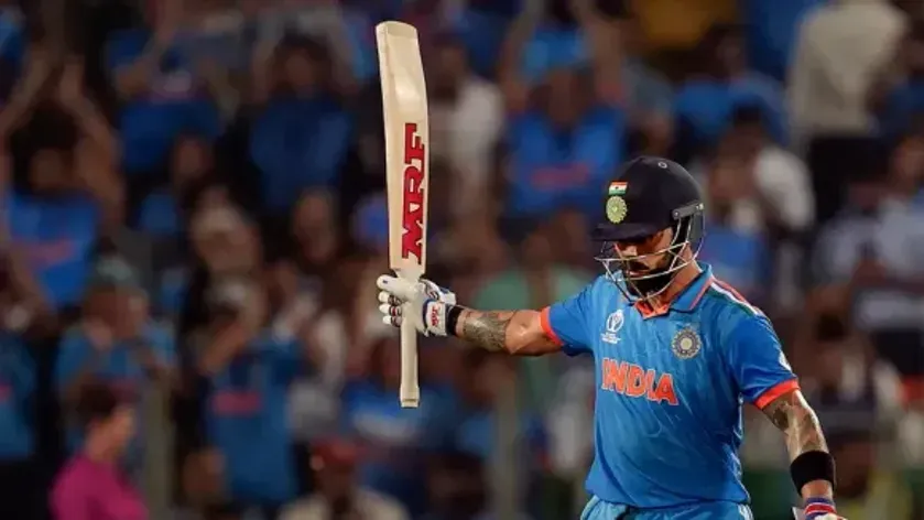 Virat Kohli celebrates his half century during the ICC Men's Cricket World Cup 2023 match between India and Bangladesh, at Maharashtra Cricket Association Stadium, in Pune, Thursday, Oct. 19, 2023.