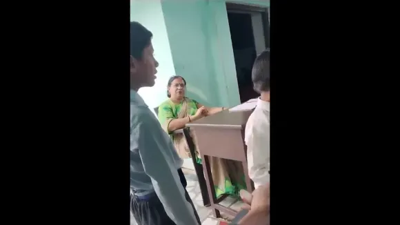 Classmates slap student
