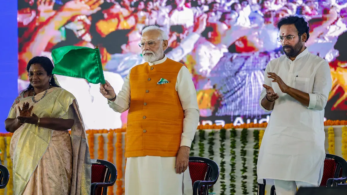 Prime Minister Narendra Modi with Telangana Governor Tamilisai Soundararajan, Union Minister and Telangana BJP President G. Kishan Reddy and BJP MP Bandi Sanjay Kumar during the foundation stone laying ceremony of various developmental projects, in Mahabubnagar district, Sunday, Oct. 1, 2023.
