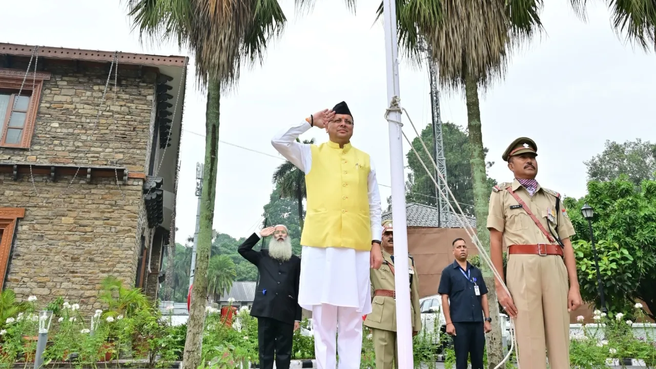 cm dhami hoist flag