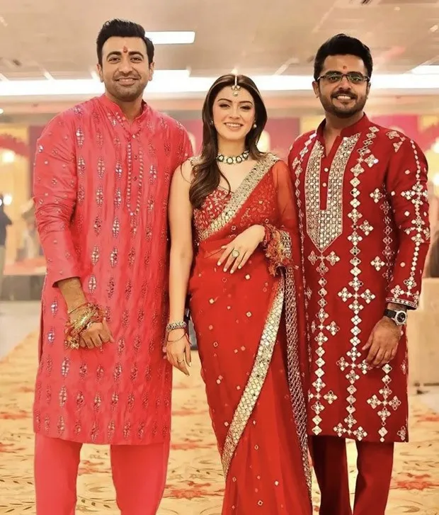 Hansika Motwani looks stunning in a red embellished saree as she kickstarts her pre wedding festivit