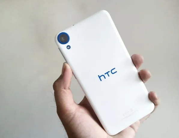 The glossy back has the HTC branding in the center and a 13 MP camera with LED flash