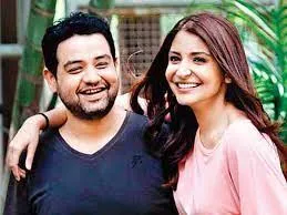 anushka and brother.jpg