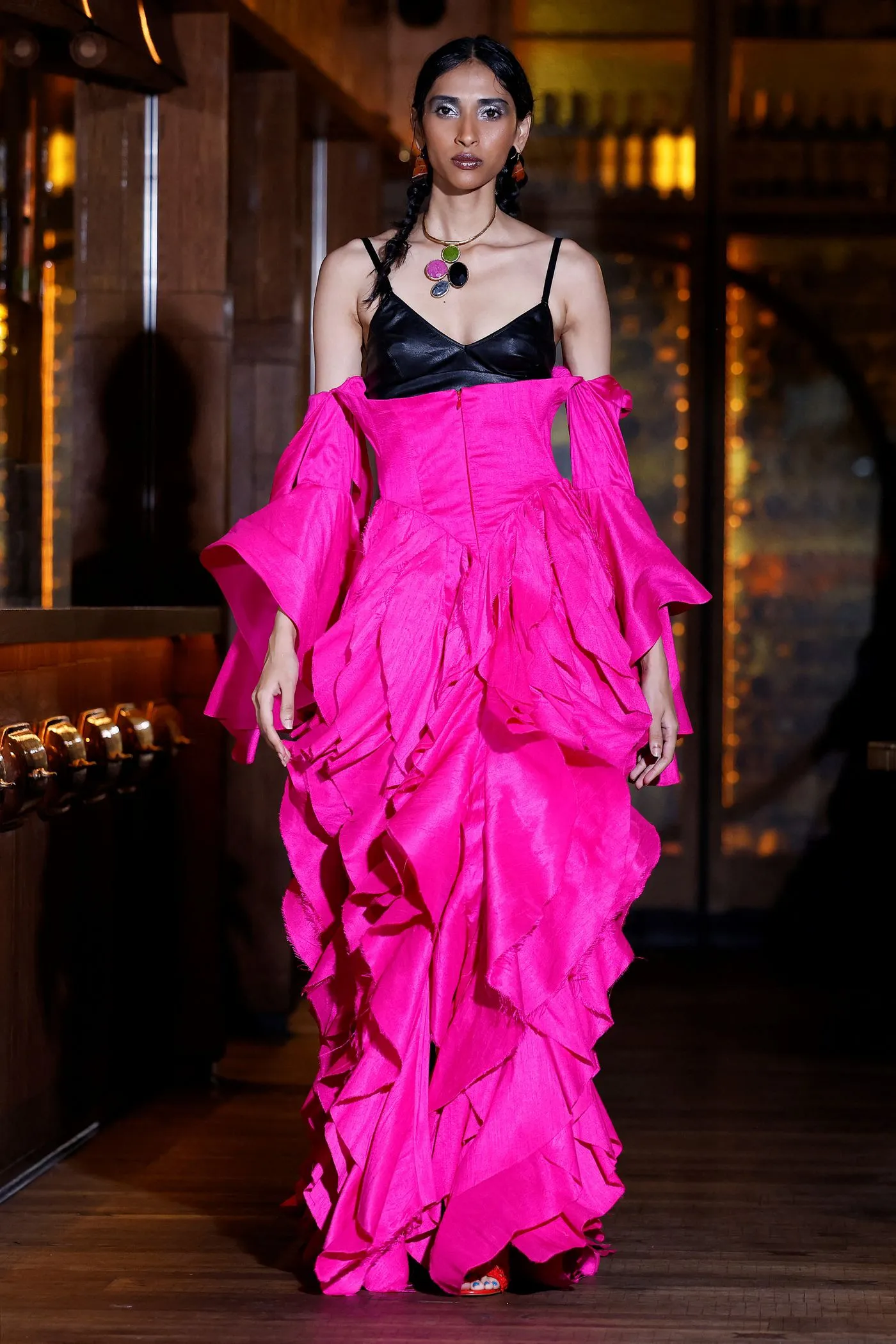 A model presents a creation by Osman during a catwalk show for the Spring/Summer 2022 collection on the fourth day of London Fashion Week in London on Sept. 20, 2021.