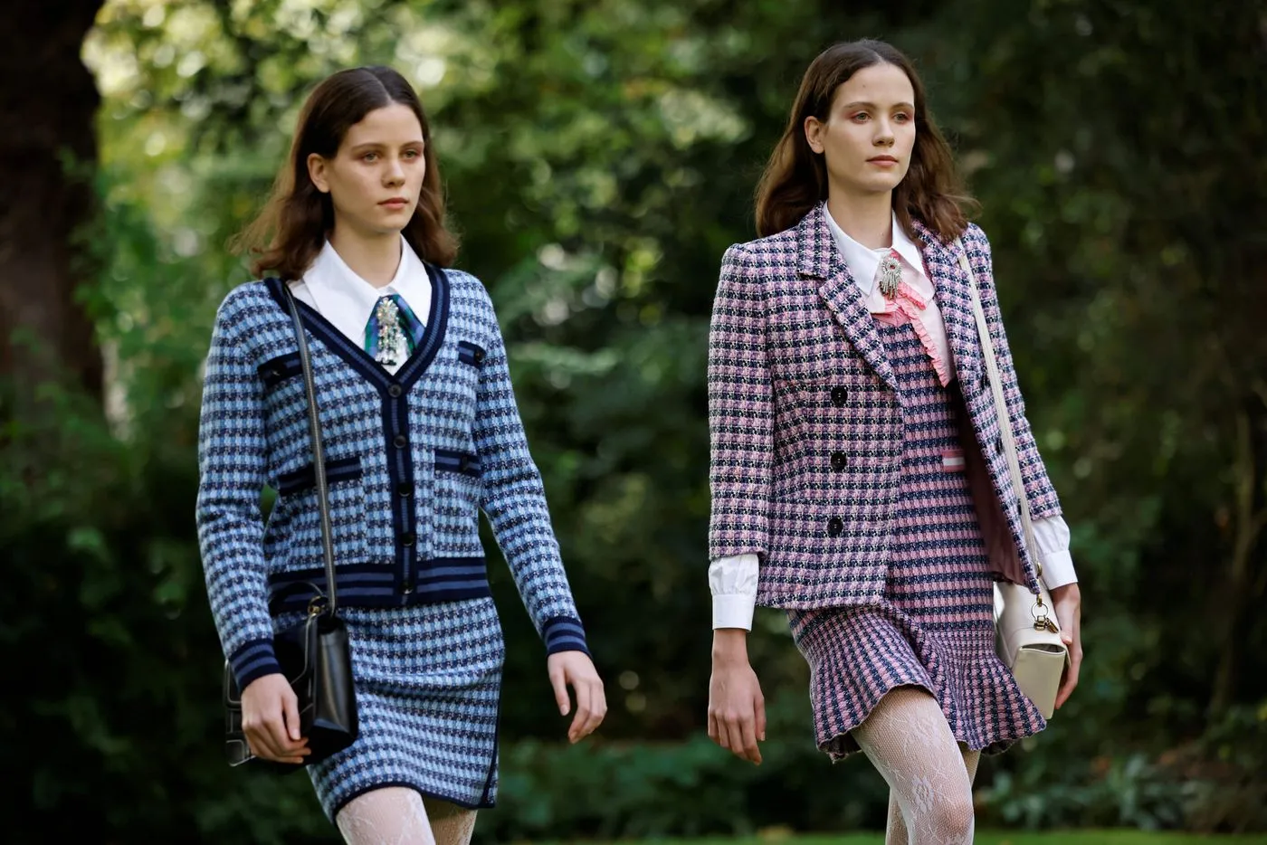 Models present creations from London-based Turkish designer Bora Aksu during a catwalk show for the Spring/Summer 2022 collection on the first day of London Fashion Week in London on Sept. 17, 2021.