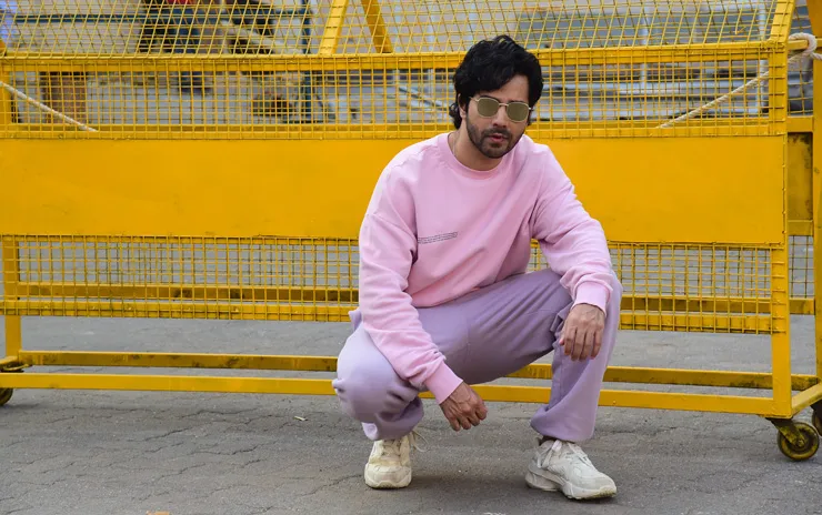 Varun Dhawan Spotted In A Pink Outfit And Reebok Sneakers For Coolie No. 1  Promotions