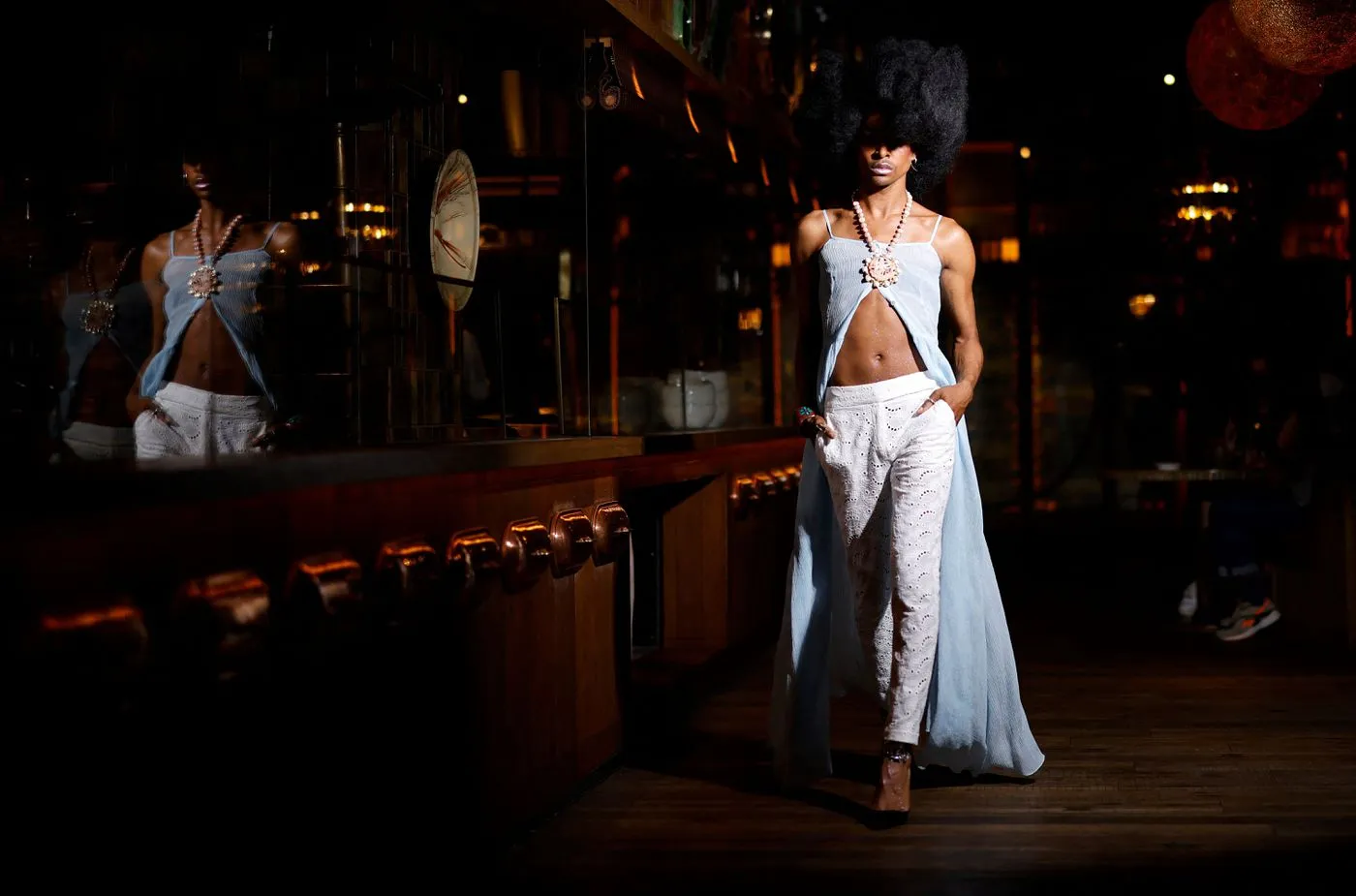 A model presents a creation by Osman during a catwalk show for the Spring/Summer 2022 collection on the fourth day of London Fashion Week in London on Sept. 20, 2021.