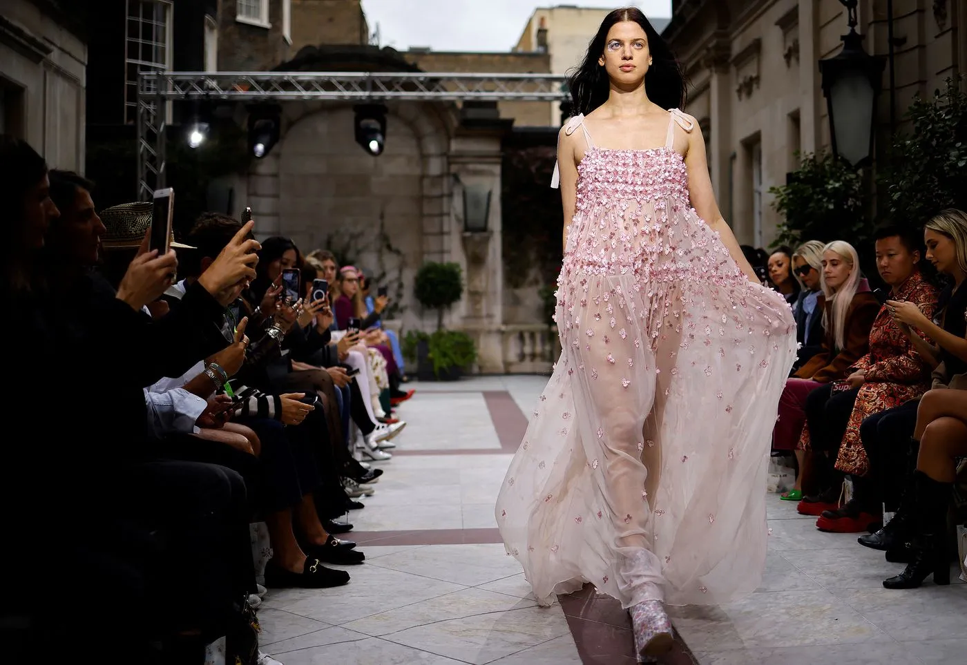 A model presents a creation from design house Paul & Joe, founded by French designer Sophie Mechaly, during a catwalk show for the Spring/Summer 2022 collection on the fourth day of London Fashion Week in London on Sept. 20, 2021.