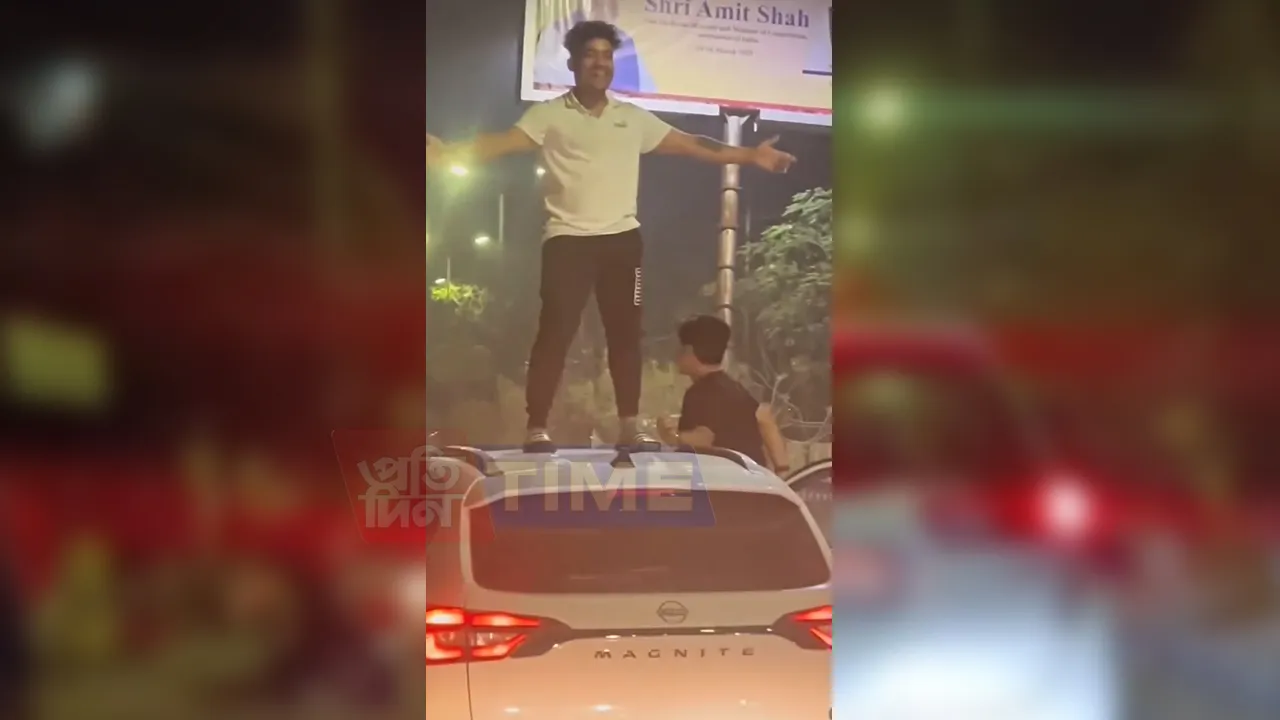 Young Man Seen Smoking While Riding on a Moving Vehicle
