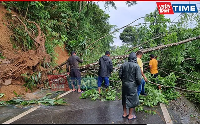 Local people engaged in clearing a road  