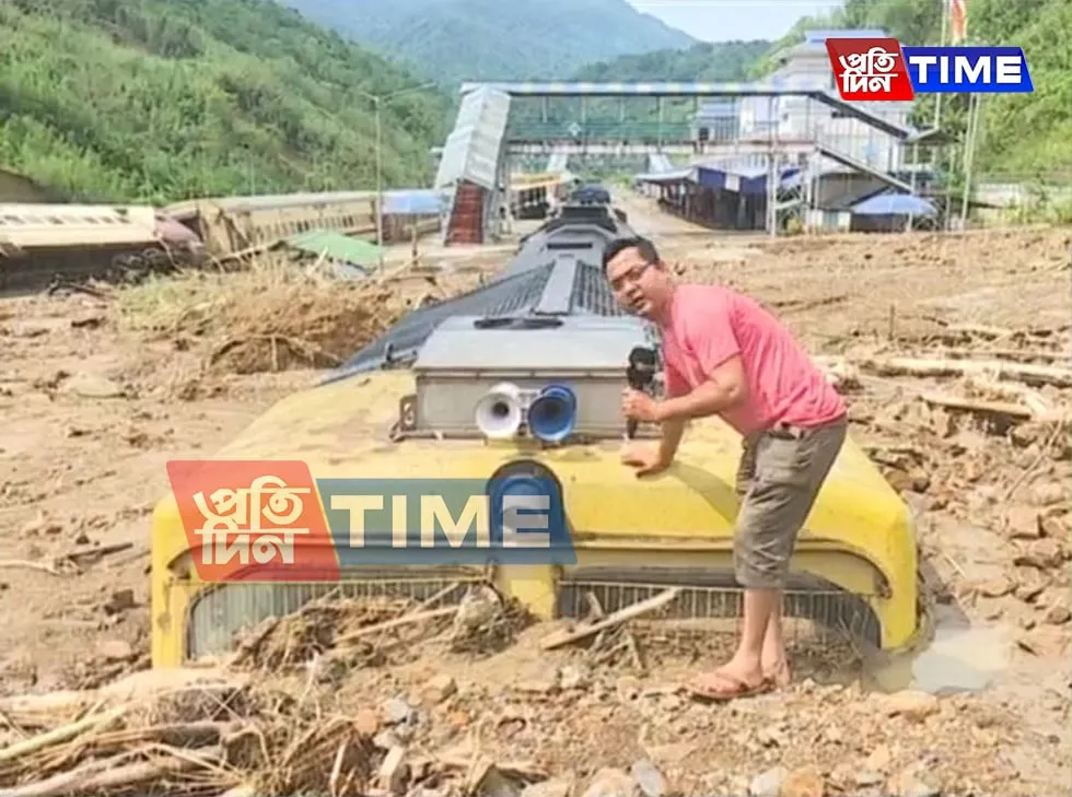 A train completely under mud in New Haflong Railway Station  
