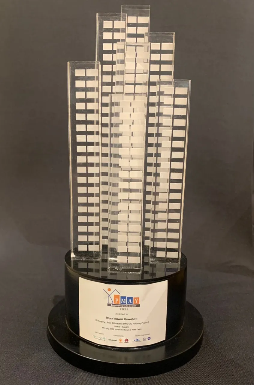 The award presented to Royal Aawas Guwahati  