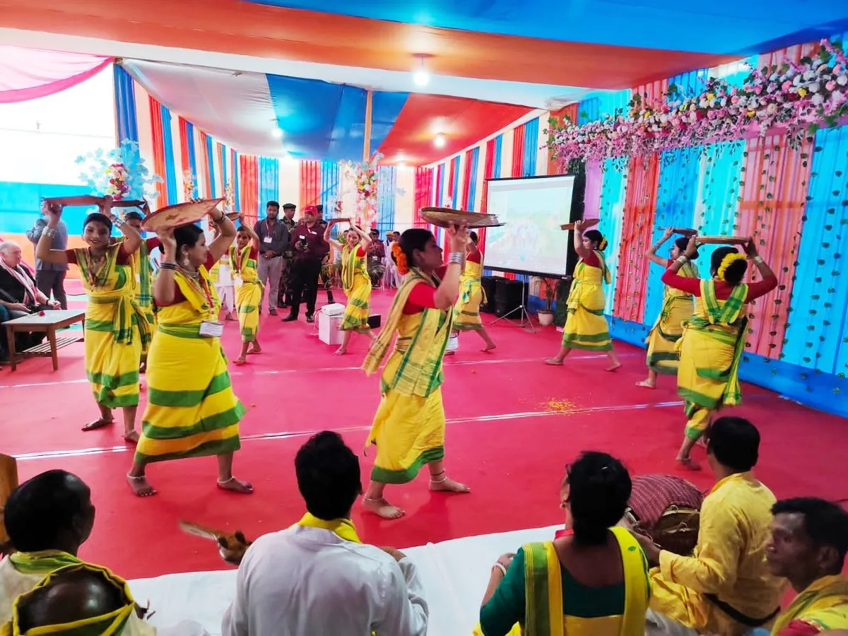 Dance troupe performing traditional Koch Rajbongshi dance   