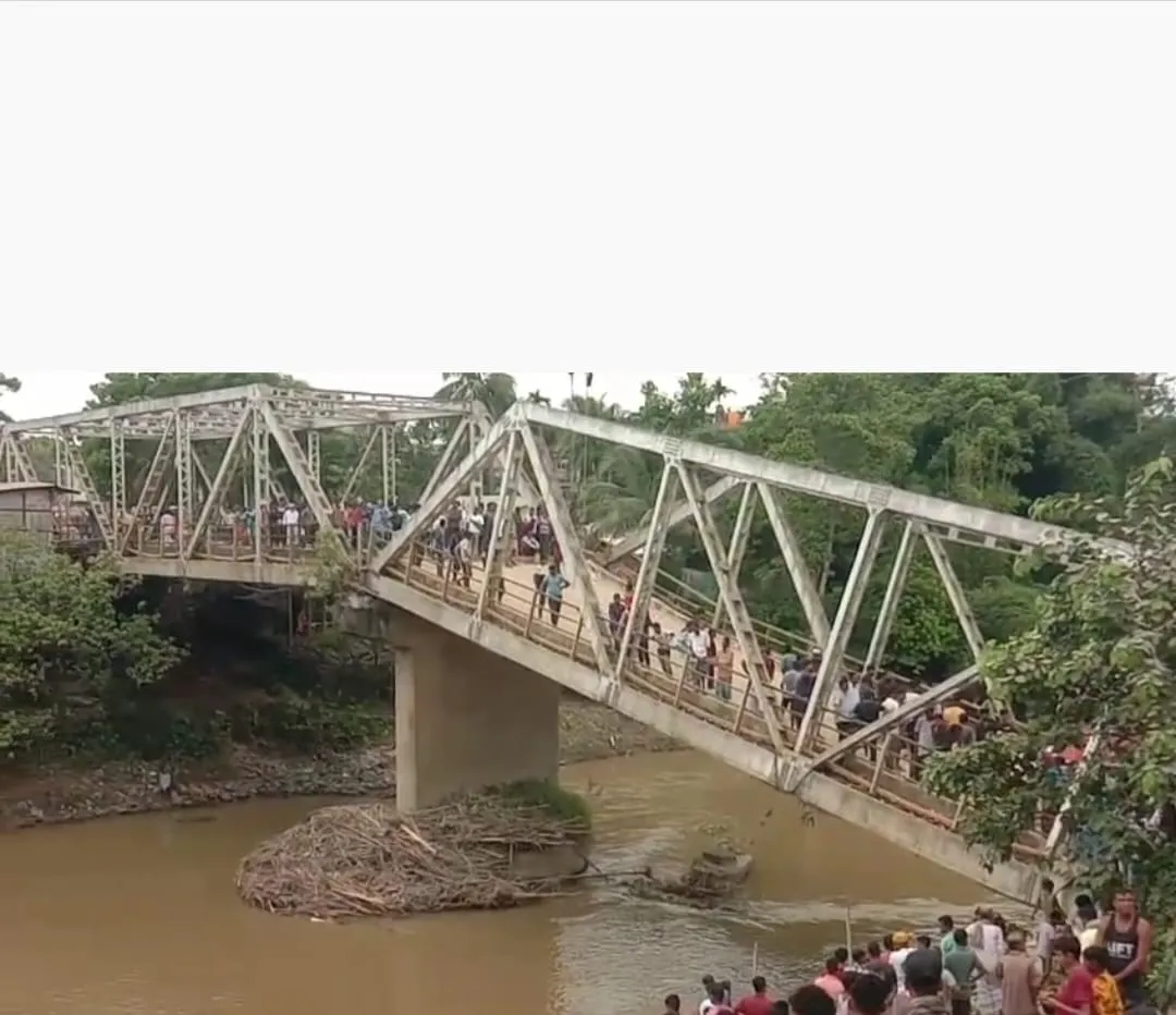 Wide angle view of bridge collapse in Dholai  