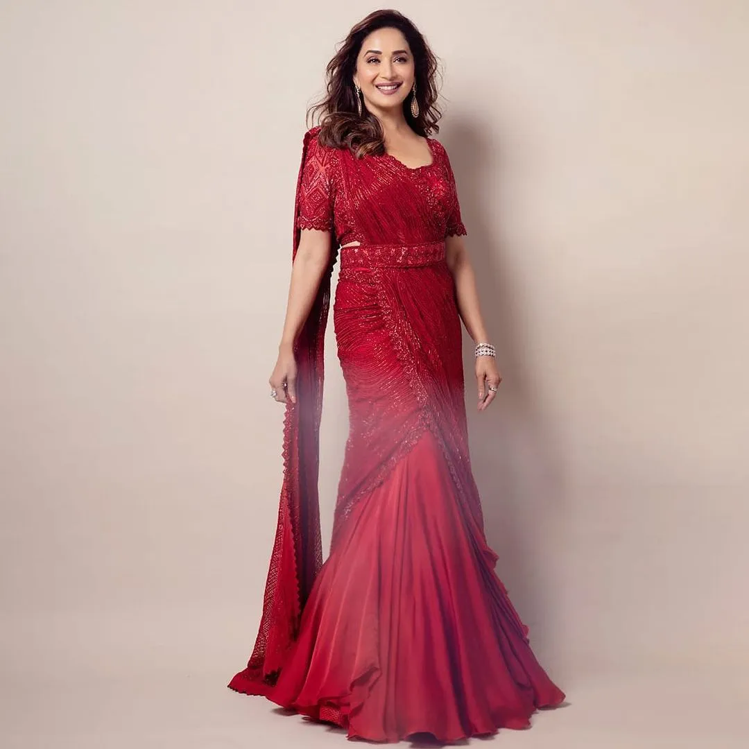 Madhuri Dixit in red lehenga-style saree  