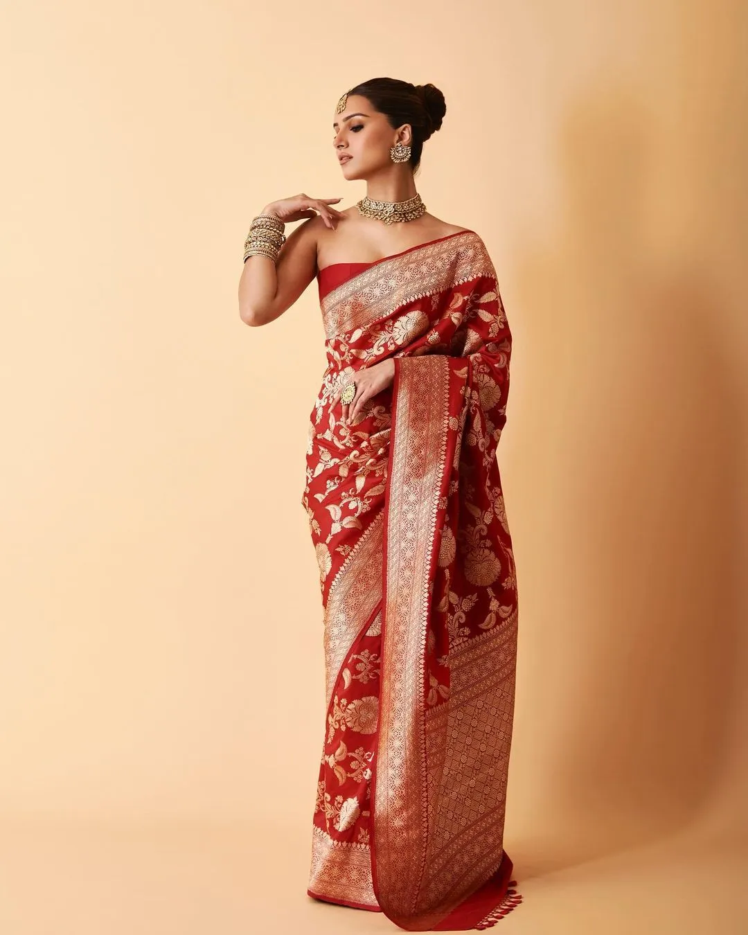 Tara Sutaria in a stunning red silk saree  
