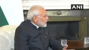 Prime Minister Narendra Modi meets British PM Theresa May in London