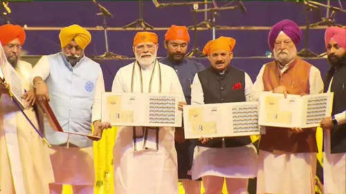 PM Modi releases a commemorative coin and postage stamp on the occasion.