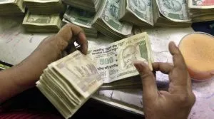 Business News: Rupee appreciates 5 paise against dollar to 64.10