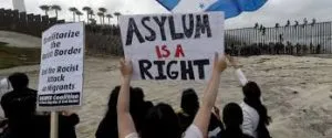 US says crossing is full before caravan tries to seek asylum