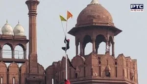 Farmers Tractor Parade : Farmers hoist the flag at the Red Fort Delhi